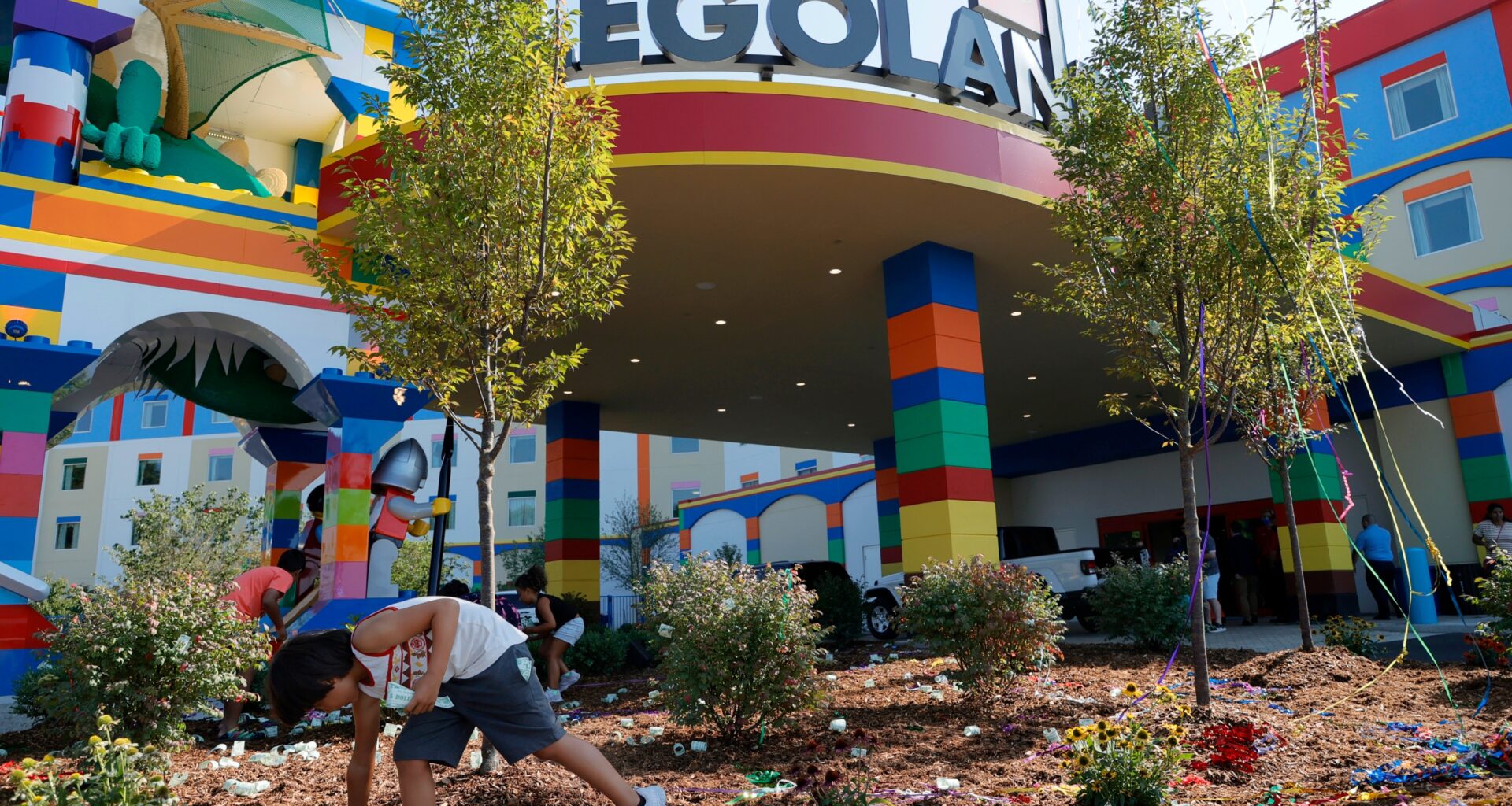 boy collects LEGO bills entrance LEGOLAND New