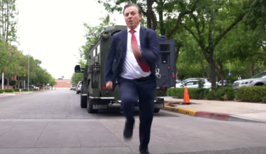 man in suit running