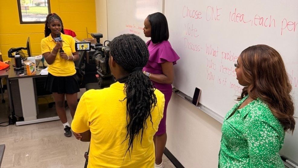 Girls take turns practicing their reporting and cameras skills at Expose Her Academy at CSUB. PHOTO: KBAK