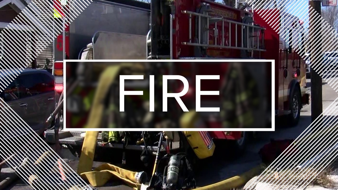Neighbor's quick action helps family escape Arden duplex garage fire