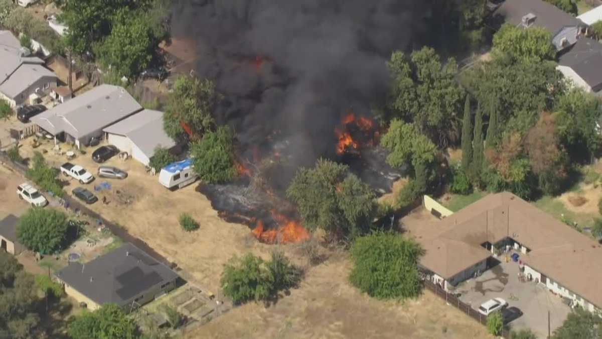 Crews respond to massive house fire in north Sacramento