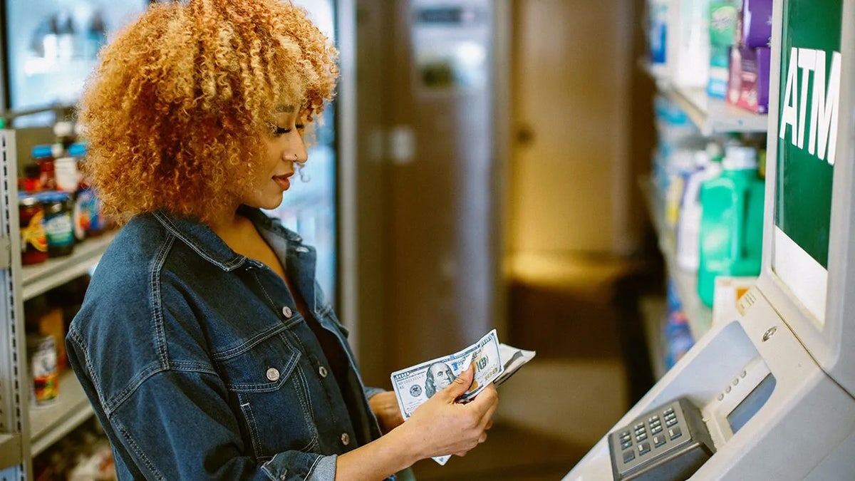 Woman at ATM