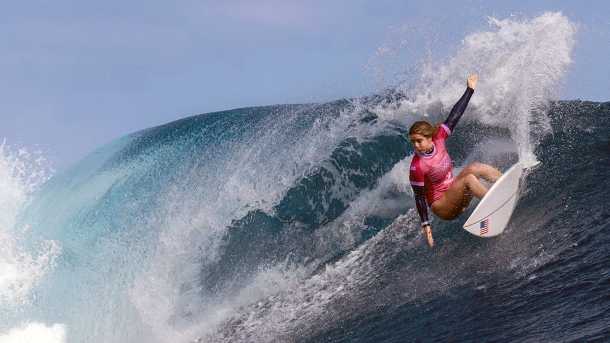 Caroline Marks rides a wave during surfing competition in Teahupo'o, French Polynesia.