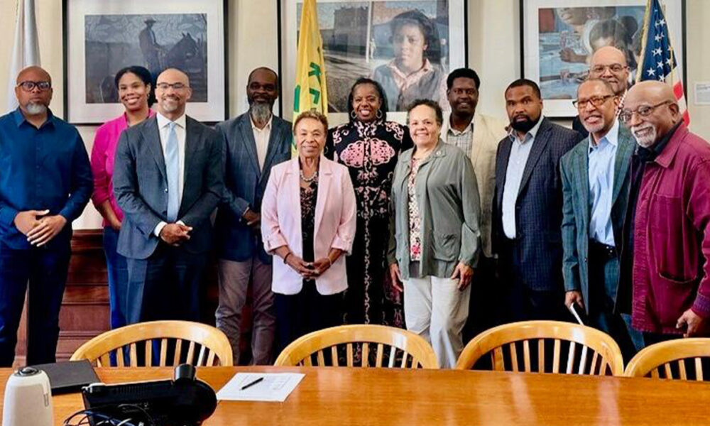 Present at the recent meeting on implementing recommendations on Oakland’s Disparity Study on city work contracts were (first row, l. to r.):  Chuck Baker, Oakland Mayor Barbara Lee and Darlene Flynn. Second row, l. to r.) Samuel Adams, Erica Astrella, Chadwick Spell, Cathy Adams, Stanley Cooper, Maria Wagner, Len Turner, Derek Barnes, Paul Cobb. Photo courtesy of Oakland Mayor’s Office.