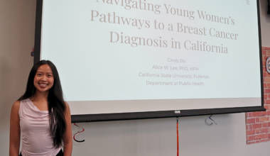 Psychology student Cindy Do presents breast cancer research.