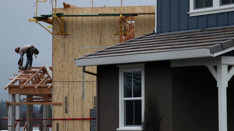 PETALUMA, CALIFORNIA - JANUARY 31: A worker builds a new home at a  housing development on January 31, 2019 in Petaluma, California. (Photo by Justin Sullivan/Getty Images)