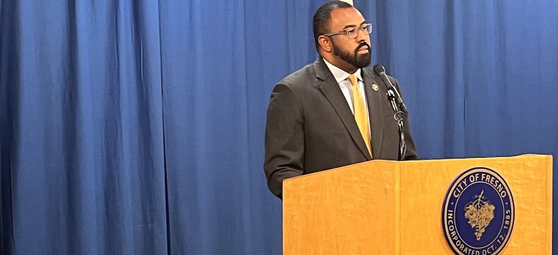 man at podium
