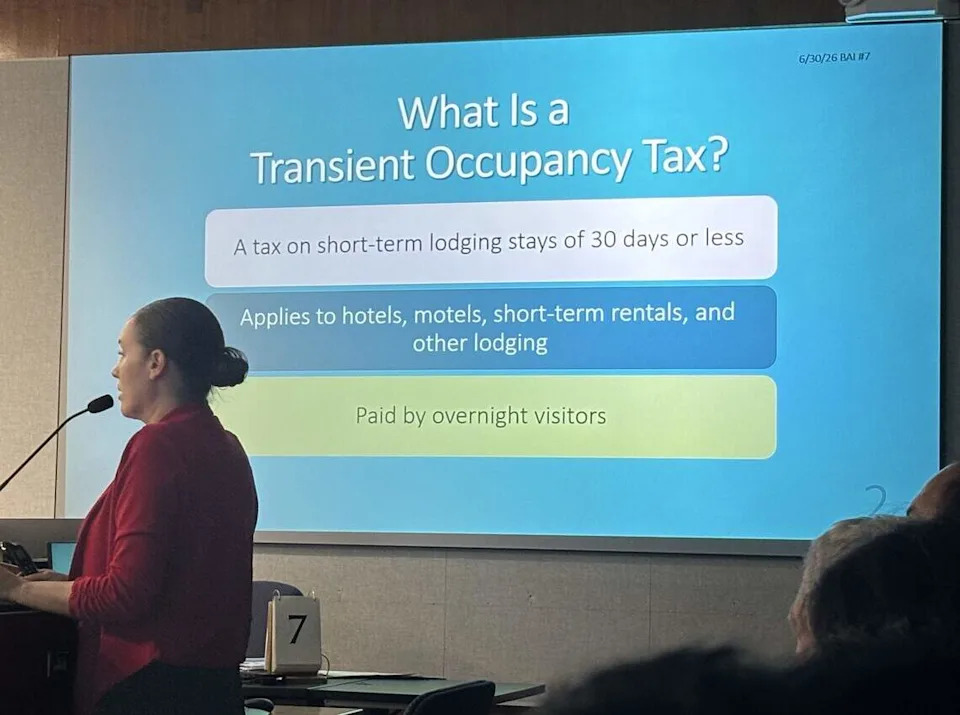 Paige Benavides, the Fresno County budget director, goes over a presentation on the proposed 12% transient-occupancy tax for rural hotels and other temporary lodging. The board of supervisors put it on the ballot for November, because the tax needs a simple majority from voters to become law.