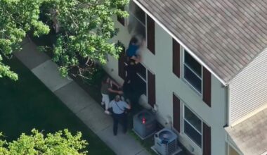 Oakland County deputy climbs trash bin to rescue children from house fire