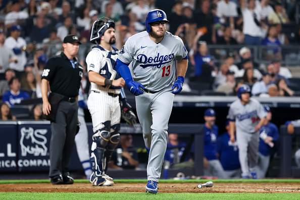 NEW YORK, NEW YORK - JULY 17: Max Muncy #13 of the Los Angeles Dodgers jogs to first base on his home run during the seventh inning against the New York Yankees at Yankee Stadium on July 17, 2026 in New York City. (Photo by Caleb Bowlin/Getty Images)