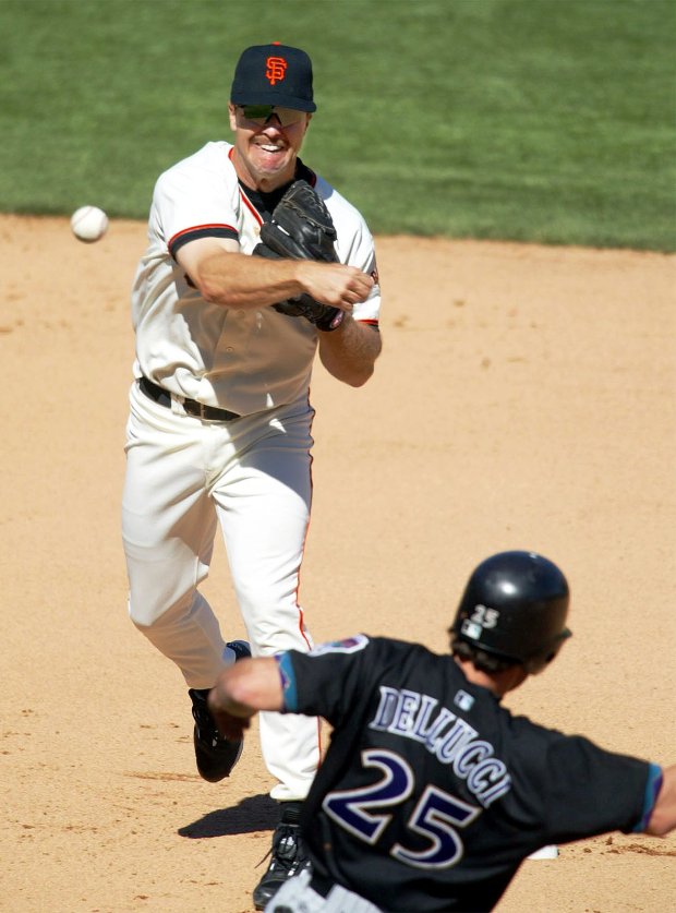 The Giants' Jeff Kent completes a double play to end the seventh inning against the Diamondbacks Sunday at Pac Bell Park. (John J. Kim/Bay Area News Group)