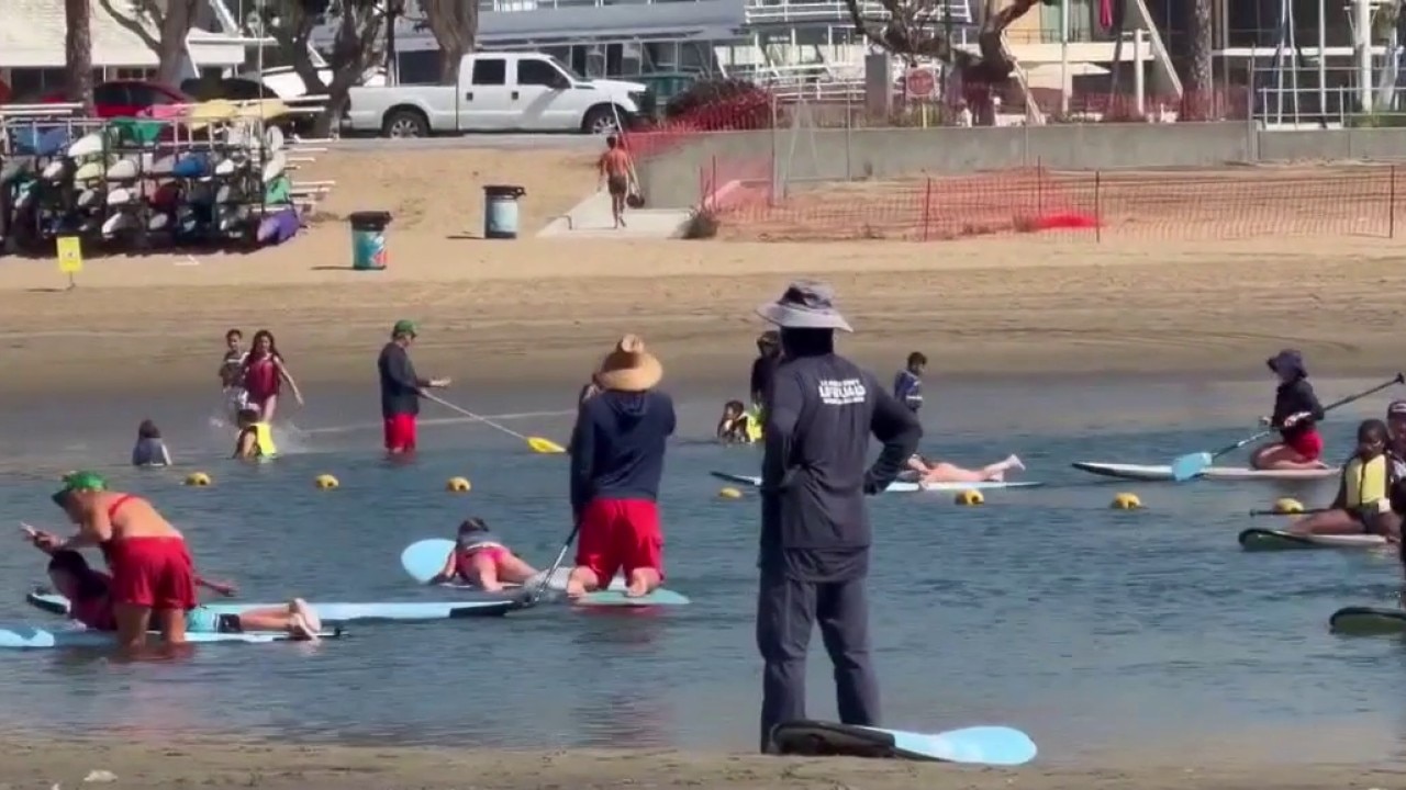 Heatwave sends crowds to beaches, triggering safety warnings