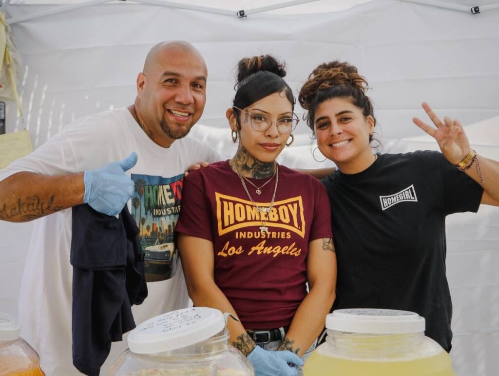 Homeboy Industries staff working and posing at one of their events