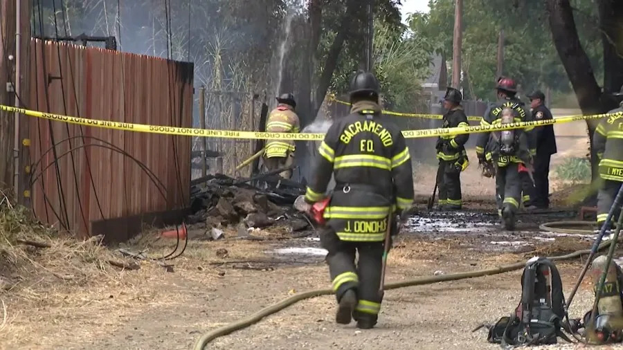 Firefighter injured after being struck by power line in Sacramento outbuilding fire