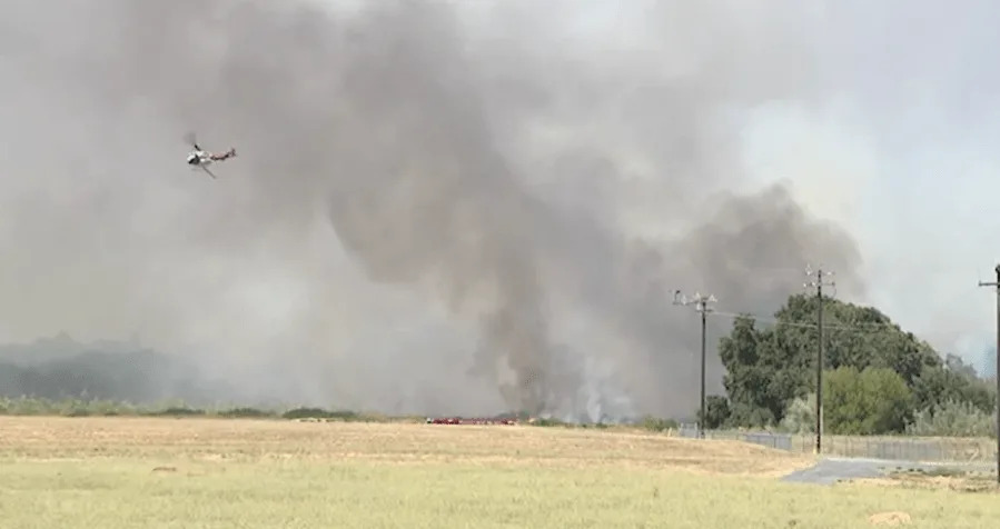 Fire burns dozens of acres near Sacramento International Airport
