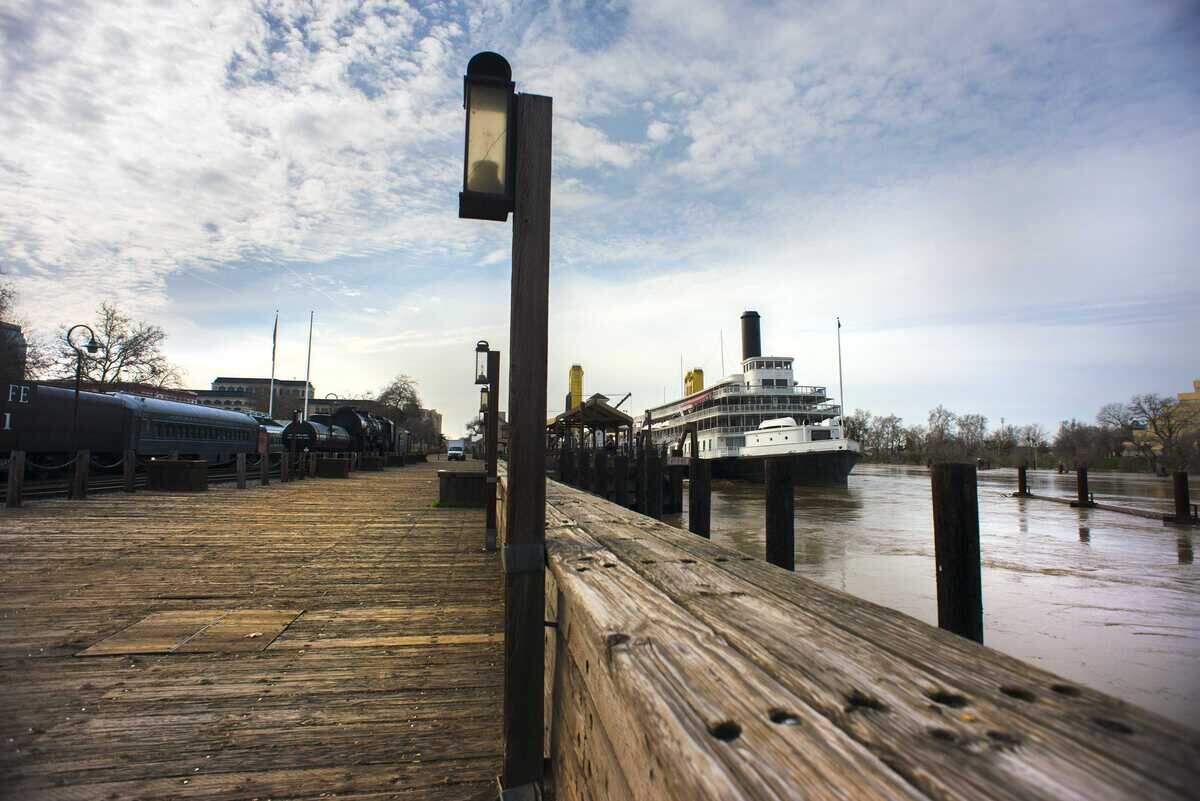 Old Sacramento’s waterfront boardwalk stretches along the Sacramento River. Police will restrict vehicle access to the historic district after 10 p.m. on weekends under a new safety plan.