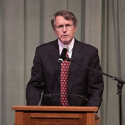 Judge William Orrick III speaking at a podium.
