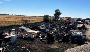 Sacramento County grass fire spreads into truck yard, damages vehicles and trailers