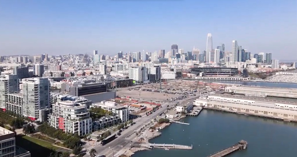 Aerial view of Mission Bay South Block 9 and the San Francisco skyline.