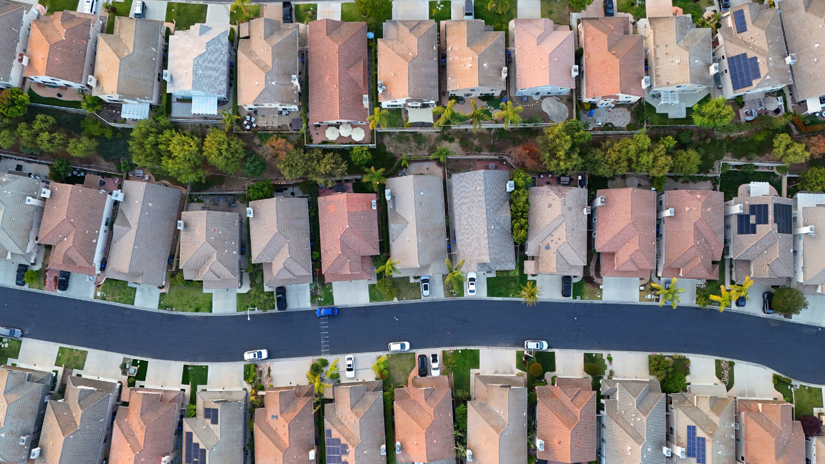 In an aerial view, family homes line the streets of a neighborhood on May 23, 2026 in Thousand Oaks, California.