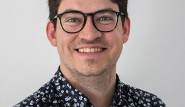 headshot of man smiling