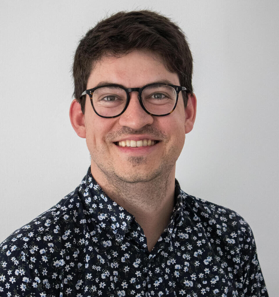 headshot of man smiling