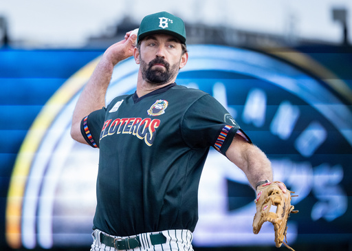 In this photo provided by Darrell S. Lavin Photography, Oakland Ballers pitcher Liam Plunkett winds up during a Pioneer League game, June 26, 2026, at Raimondi Park in Oakland, Calif. (Darrell S. Lavin/Darrell S. Lavin Photography via AP)