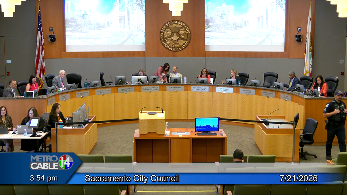 Sacramento Mayor Kevin McCarty and Vice Mayor Karina Talamantes speak during a hot-mic moment at a City Council meeting