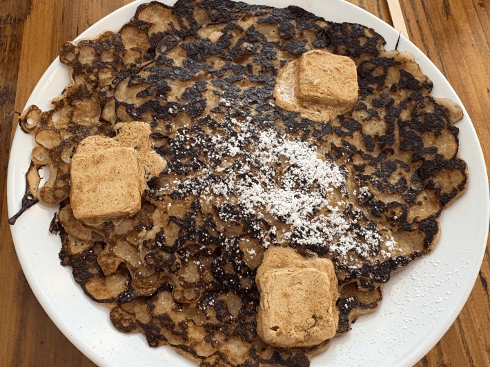 a pancake with cinnamon molasses butter