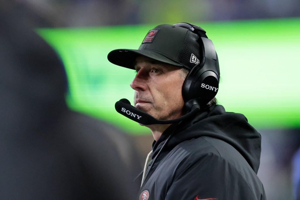 San Francisco 49ers head coach Kyle Shanahan looking to the field.