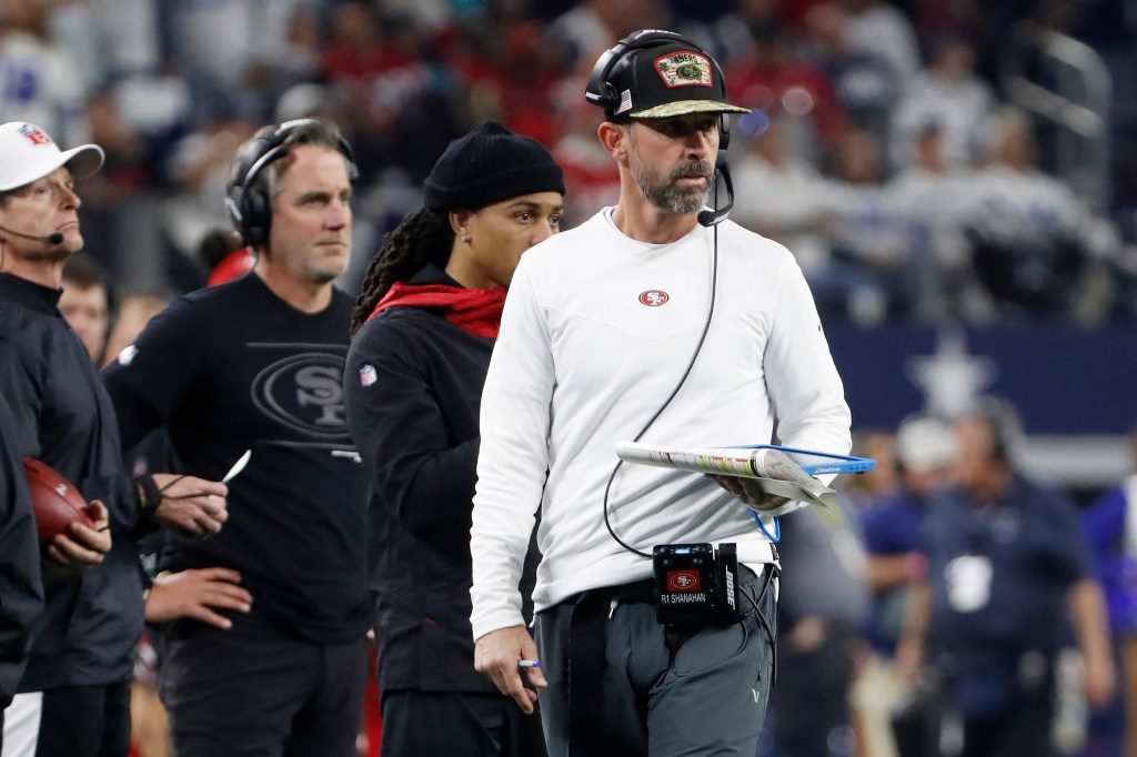 San Francisco 49ers head coach Kyle Shanahan watches from the sideline during a game.