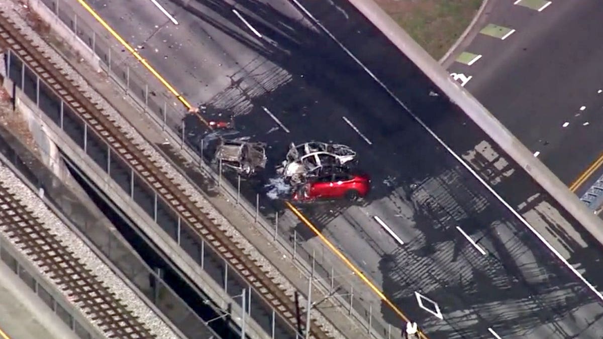 An aerial view shows burned vehicles following a fatal crash on Highway 87 in San Jose, California.