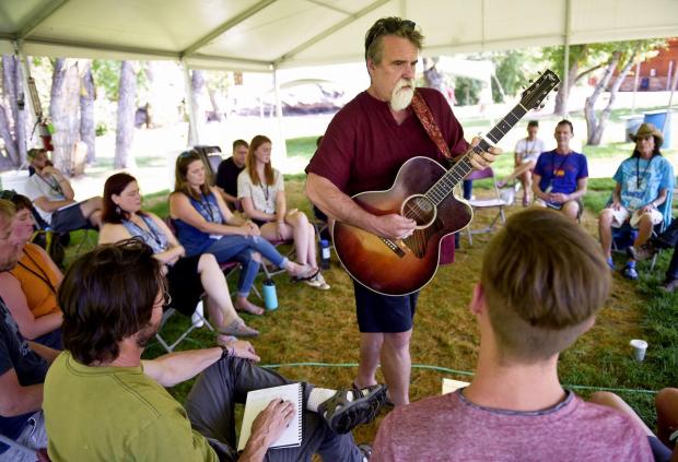 Instructor Darrell Scott performs a song for his students during an afternoon session of The Song School at Planet Bluegrass on Aug. 13, 2018. The Song School preceded the Rocky Mountain Folks Festival. (Lewis Geyer, Times-Call)