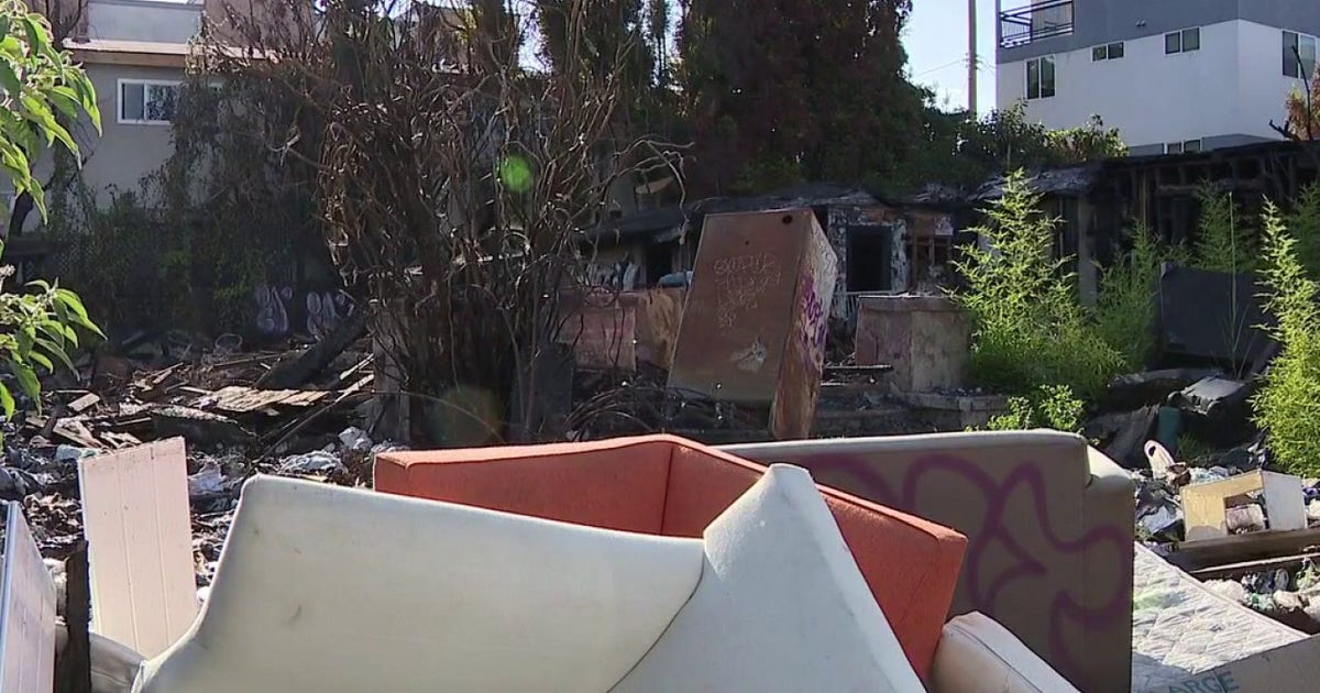 Family says squatters still plague property four months after devastating fire