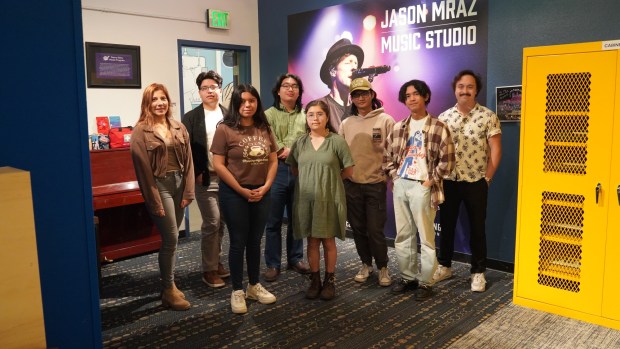 High school and college composers in Art of Elan's Young Artists in Harmony program in the Jason Mraz Music Studio at (ARTS) A Reason to Survive in National City. Works by this year's composers will be performed there on Nov. 21. (Vincent Martinez)