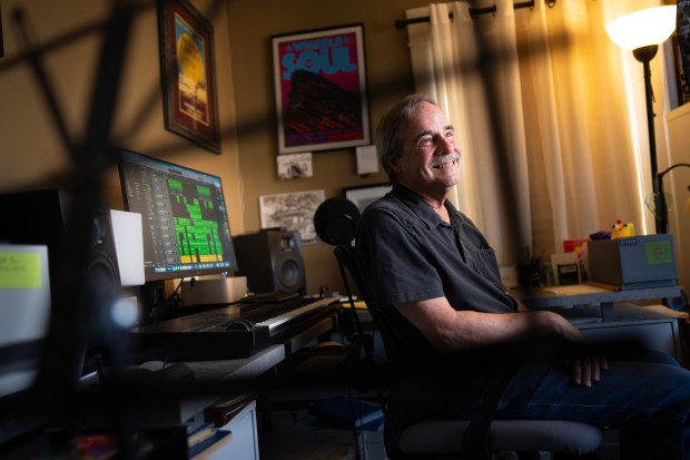 Clark Clipson, 72, of Mission Hills, is a retired forensic psychologist and currently works as a songwriter, working from his music studio in his home with musicians from all over the world.  (Nelvin C. Cepeda / The San Diego Union-Tribune)