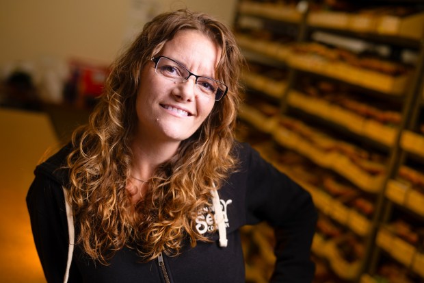 At her warehouse in the Mt. Hope Community in San Diego, CA, Brijette Peña, 37, owner and funder of San Diego Seed Company, shares her thoughts on what it means to be an American. (Nelvin C. Cepeda / The San Diego Union-Tribune)