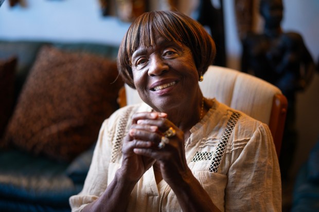 At her home, where she has lived for the past 30 years, Cecelia Fowler, 76, a retired social worker, now works part-time as a real estate agent. (Nelvin C. Cepeda / The San Diego Union-Tribune)