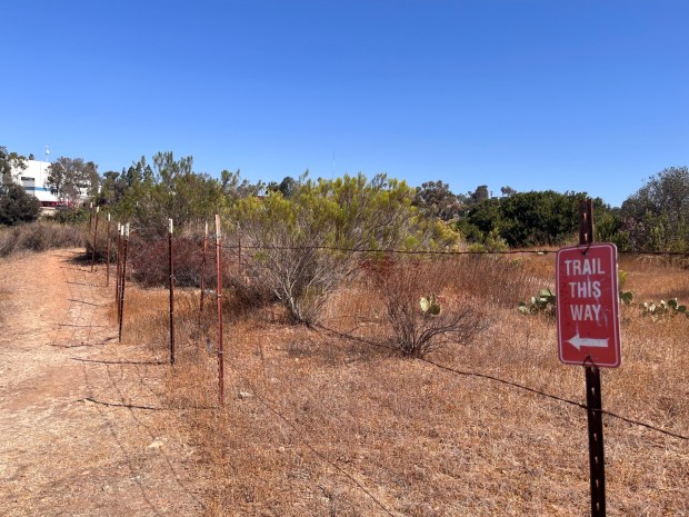 Near the second half of the hike, signs direct hikers along the trail. (Maura Fox / The San Diego Union-Tribune)