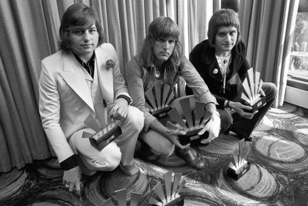Howard Jones cites the seminal English progressive-rock band Emerson, Lake & Palmer (shown here in 1972) as a prime musical inspiration. The group's members are, from left, bassist/singer Greg Lake, keyboardist Keith Emerson and drummer Carl Palmer. Lake and Emerson are both deceased. (PA file photo via AP)