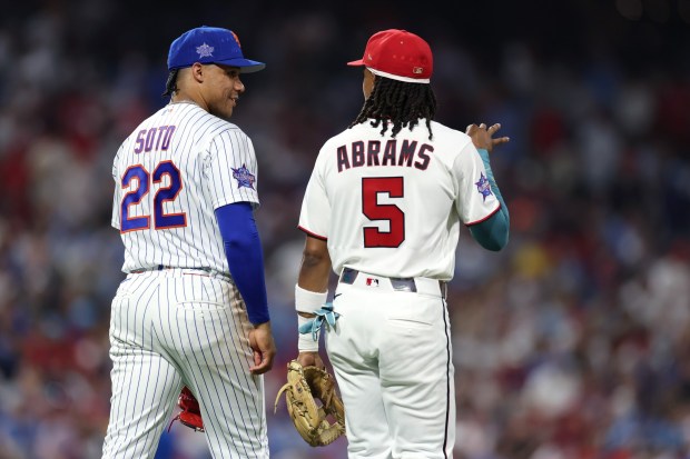 Juan Soto of the New York Mets and CJ Abrams of the Washington Nationals, who were once traded for each other, walk and talk on their way onto the field during the second inning of the 2026 MLB All-Star Game at Citizens Bank Park. (Photo by Al Bello/Getty Images)