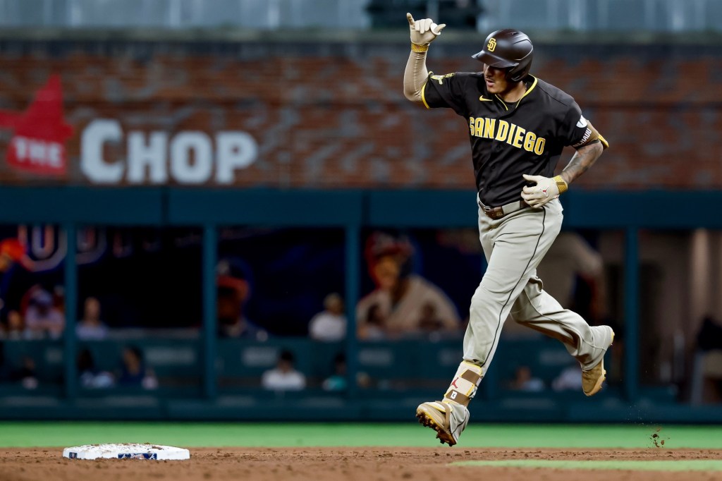 Manny Machado homers twice, Walker Buehler rebounds, as Padres even series against Braves