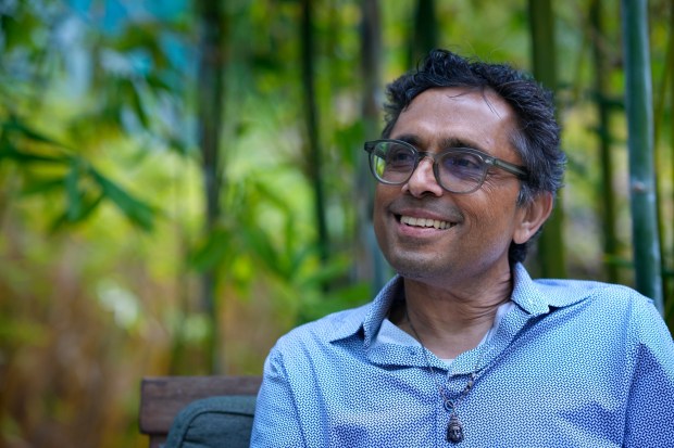 On Tuesday, June 30, 2026, Raj Aji, 64, sat in the outdoor garden at Moores Cancer Center at UC San Diego. He has been receiving treatment and medication for his pancreatic cancer as part of a clinical study. Aji mentioned that since his diagnosis, he has become more focused on his life priorities. (Nelvin C. Cepeda / The San Diego Union-Tribune)