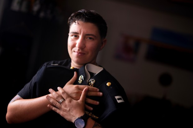 Capt. Sye Savoie serves in the U.S. Marine Corps as a pilot who flies UH Huey helicopters. They have been placed on administrative leave and are in the process of being involuntarily separated from their military service. (Nelvin C. Cepeda / The San Diego Union-Tribune)