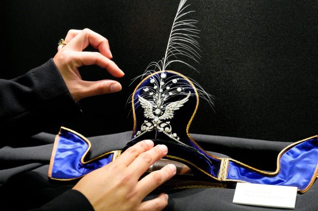 Carlsbad, CA - March 19: Diamond Aigrette/tiara circa 1910. Silver, gold, and diamond aigrette tiara circa 1910. Hand fabricated; this piece converts to a hat pin, brooch, and pendant. Gift of the Greenfield family. (Nelvin C. Cepeda The San Diego Union-Tribune)