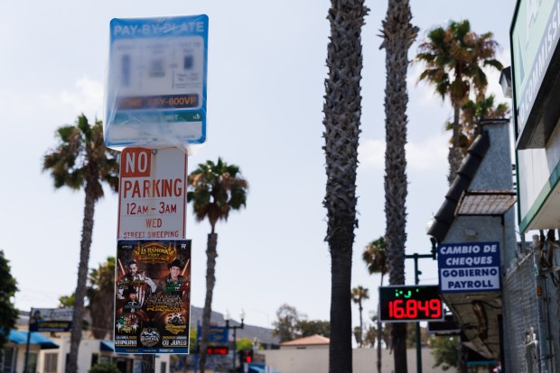 A parking sign is shown installed along East San Ysidro Boulevard on Thursday, June 25, 2026. (Kristian Carreon / The San Diego Union-Tribune)