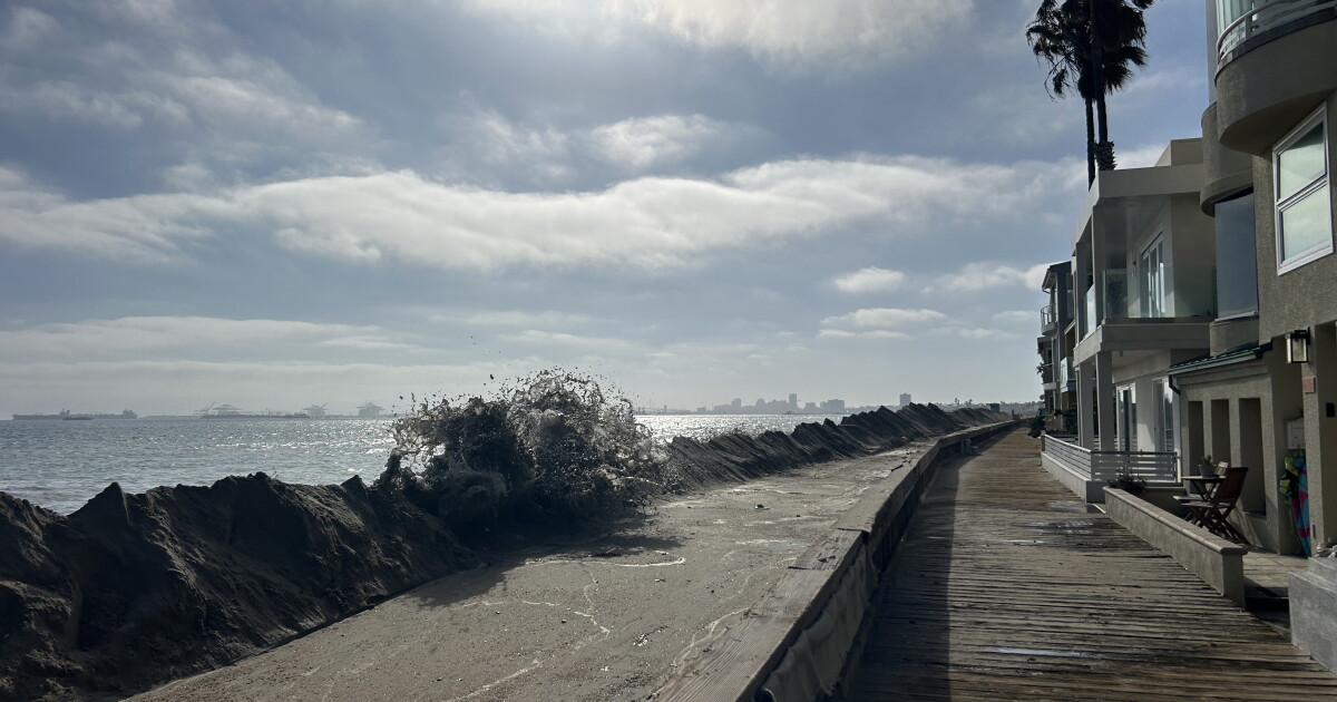 High tides provide glimpse into rising sea levels. A Long Beach neighborhood is on the front lines