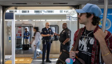 Riders on Metro Board