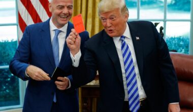 World Cup final protesters give red cards to Trump, FIFA president