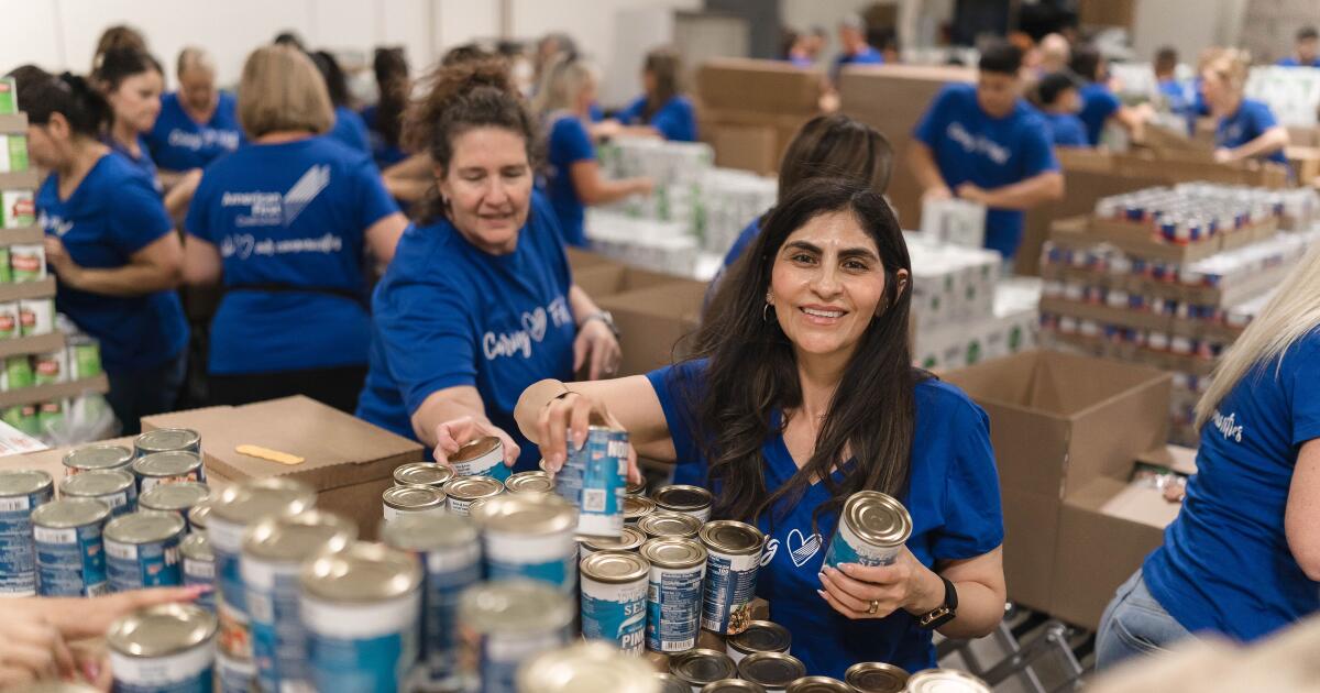 American First Credit Union employees lend hand at OC Food Bank